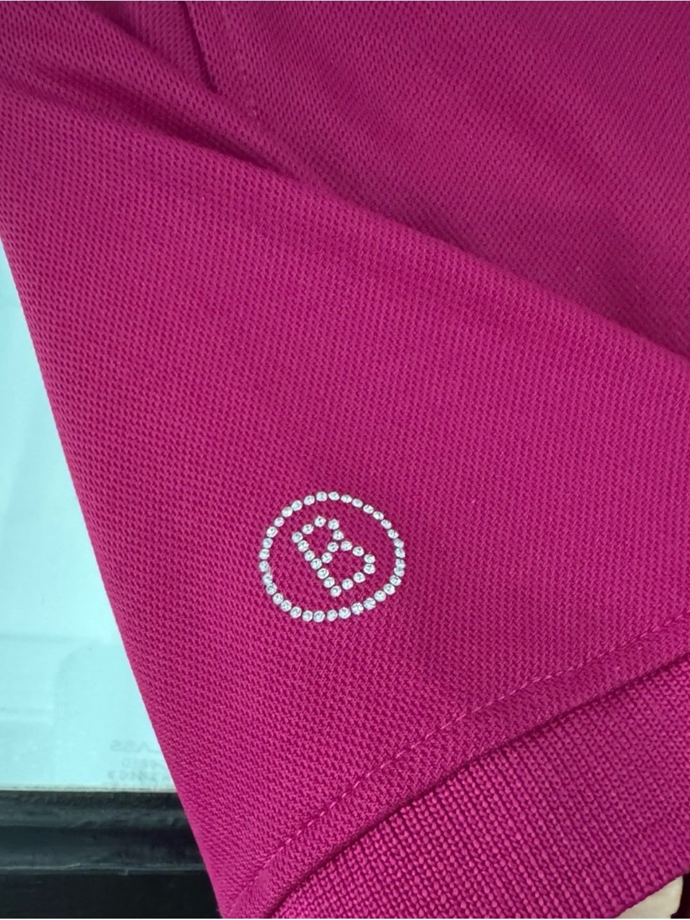 Bogner Women’s Short-Sleeve Polo in Magenta w/rhinestone logo